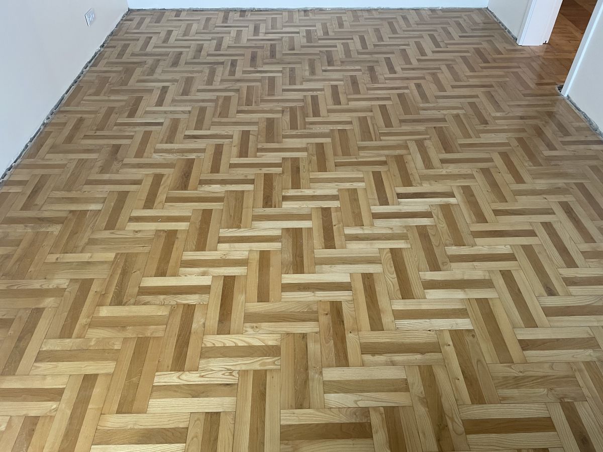 Szlifowanie, cyklinowanie parkietu i montaż białych MDF